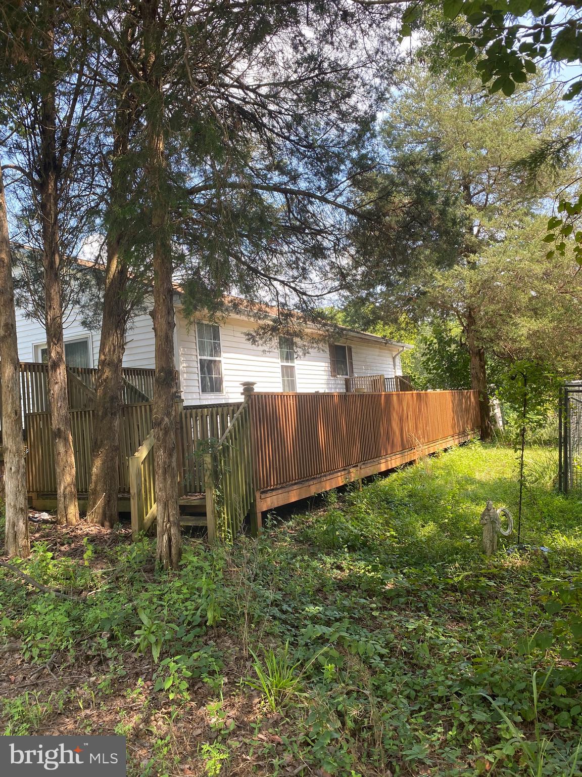 22313 Evergreen Mills Road Leesburg, VA 20175 - Photo 7 of 8 Large deck on side of home