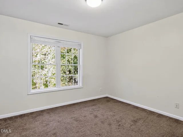 an empty room with closet