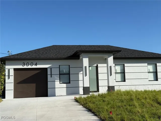 $290,000 | 3004 2nd Street West, Lehigh Acres, FL 33971