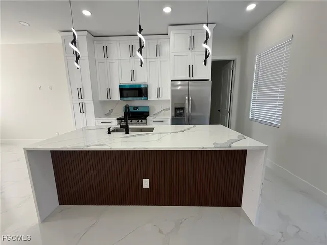 $290,000 | 3004 2nd Street West, Lehigh Acres, FL 33971