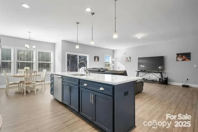a kitchen with lots of counter space and a sink