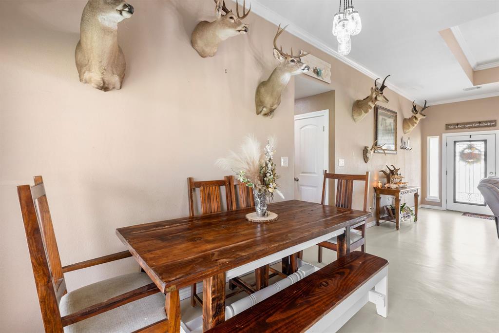 660 Milton-Minter Road Deport, TX 75435 - Photo 18 of 40 a view of a dining room with furniture