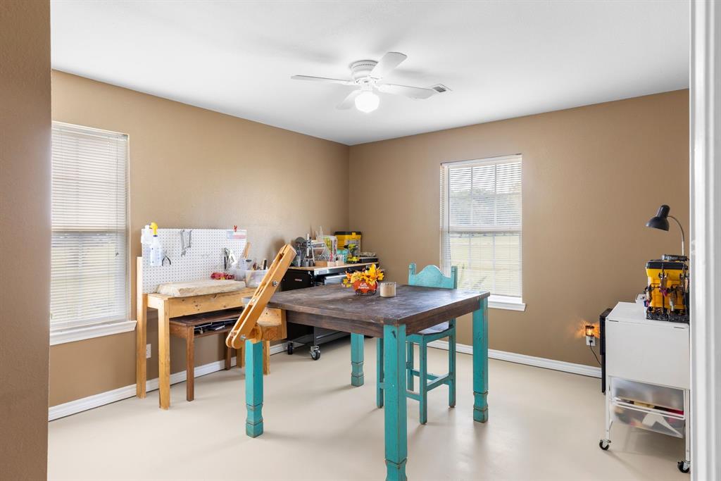 660 Milton-Minter Road Deport, TX 75435 - Photo 28 of 40 a view of a workspace with furniture and a window