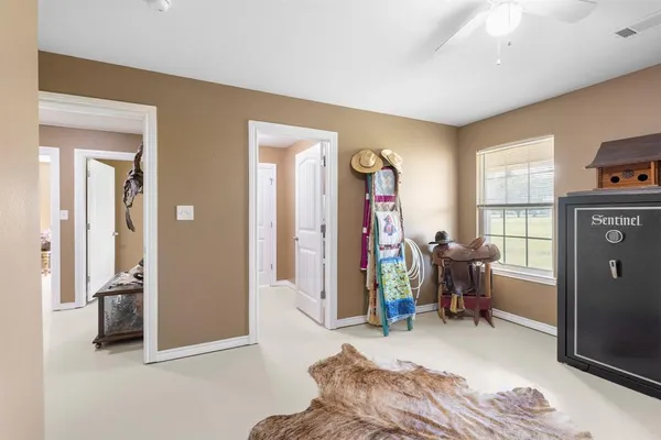 a living room with furniture window and a table