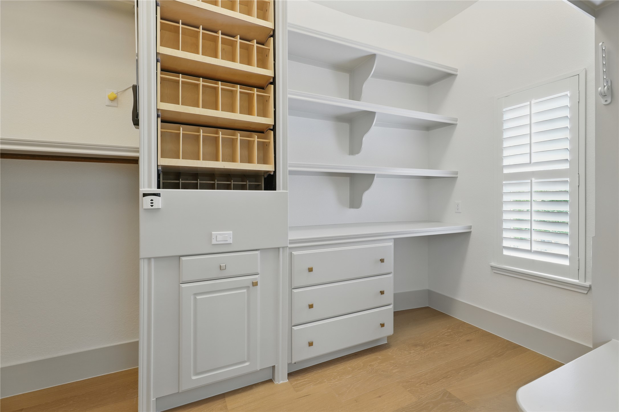 6905 Rudi Cove Austin, TX 78759 - Photo 30 of 36 a view of an empty room with cabinet and a window