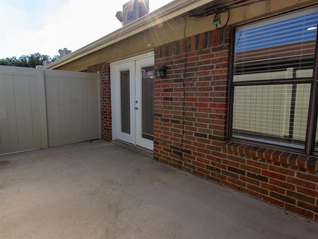 2240 Tarpley Road, Unit 62 Carrollton, TX 75006 - Photo 19 of 20 a view of a house with a door