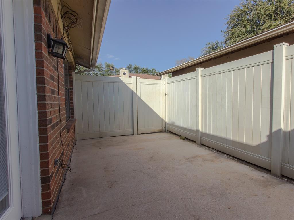 2240 Tarpley Road, Unit 62 Carrollton, TX 75006 - Photo 20 of 20 a view of a house with a street