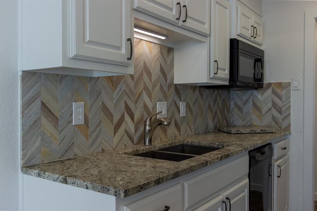 2240 Tarpley Road, Unit 62 Carrollton, TX 75006 - Photo 3 of 20 a view of a kitchen counter top space