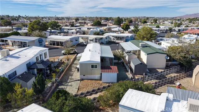 an aerial view of a house with a garden