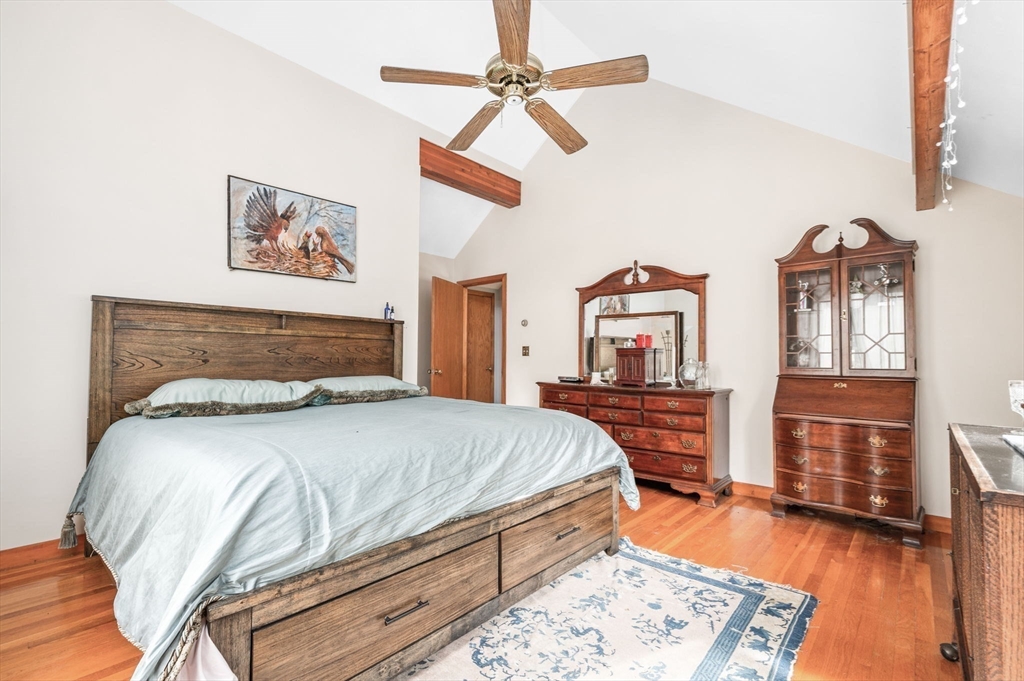 16 Wheeler Road Princeton, MA 01541 - Photo 18 of 40 a bedroom with a bed a dresser and wooden floor