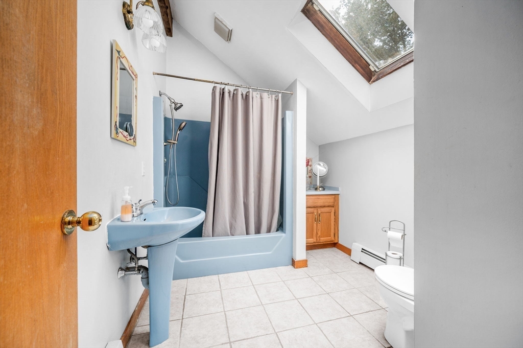 16 Wheeler Road Princeton, MA 01541 - Photo 20 of 40 a bathroom with a sink and a mirror