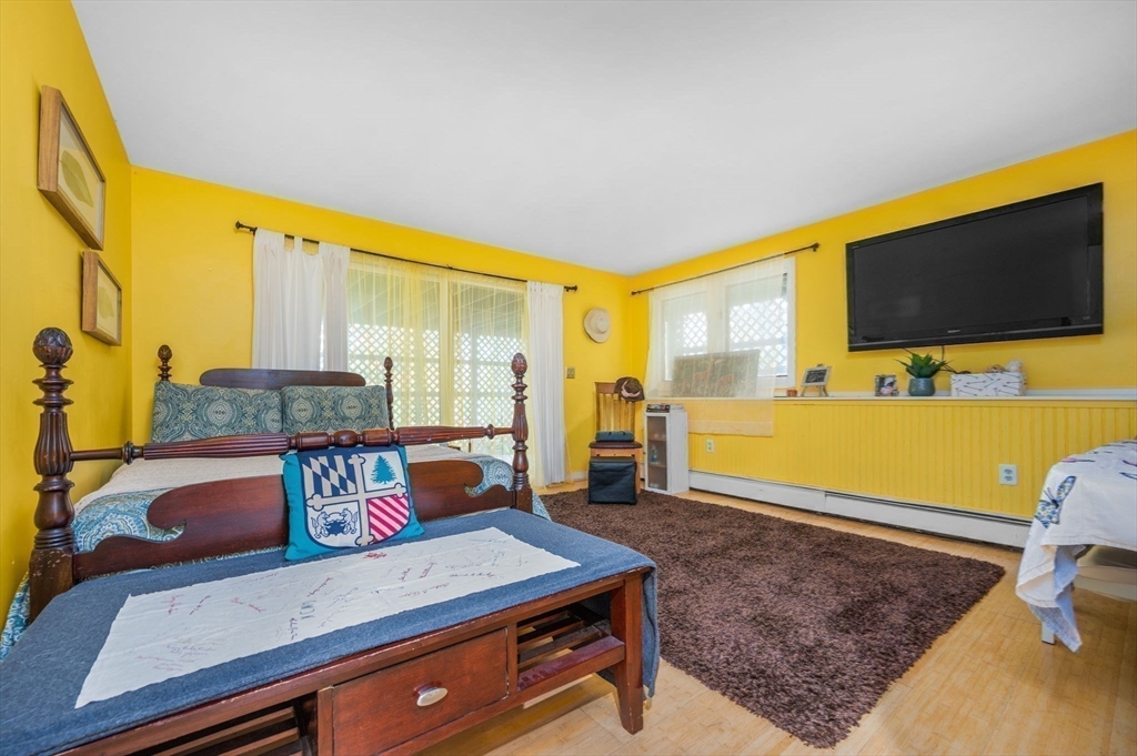 16 Wheeler Road Princeton, MA 01541 - Photo 21 of 40 a living room with furniture and a flat screen tv