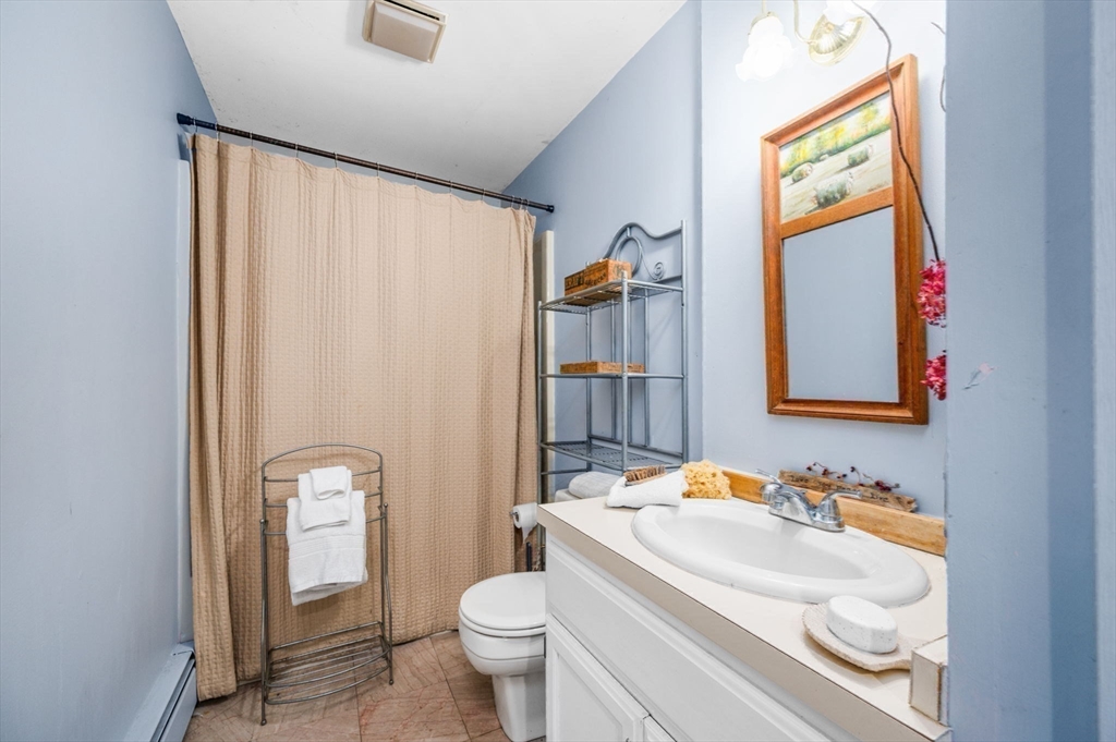 16 Wheeler Road Princeton, MA 01541 - Photo 24 of 40 a bathroom with a sink and a mirror