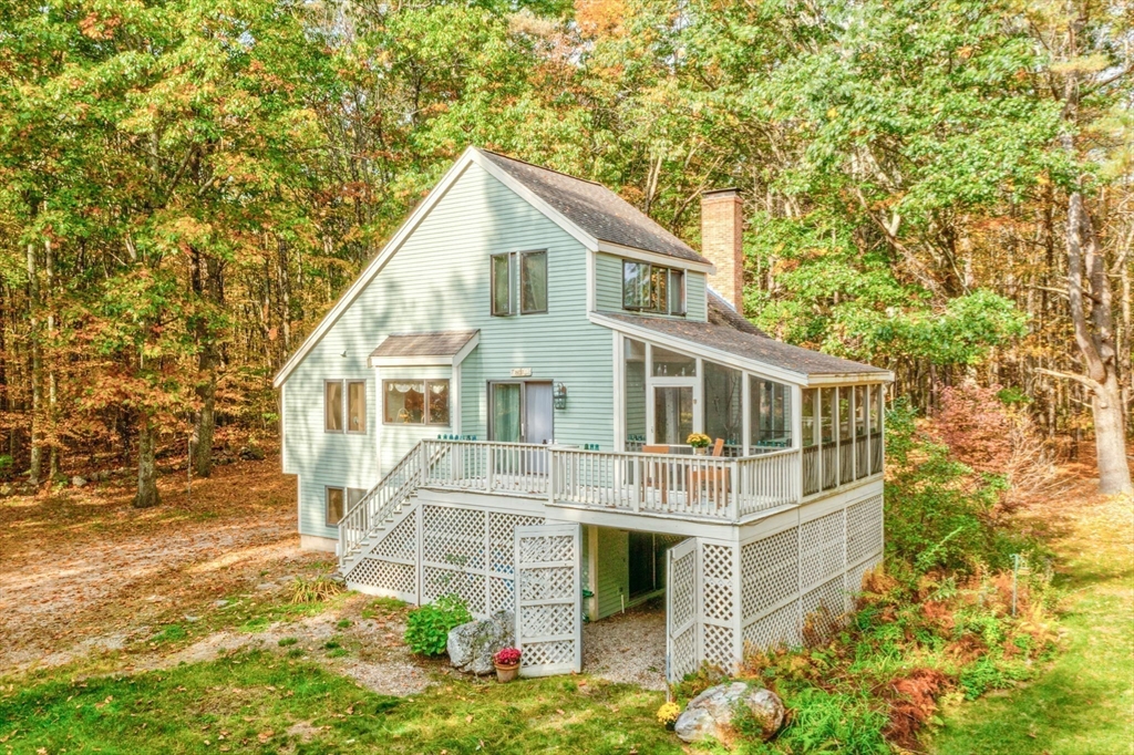 16 Wheeler Road Princeton, MA 01541 - Photo 3 of 40 a front view of a house with a yard