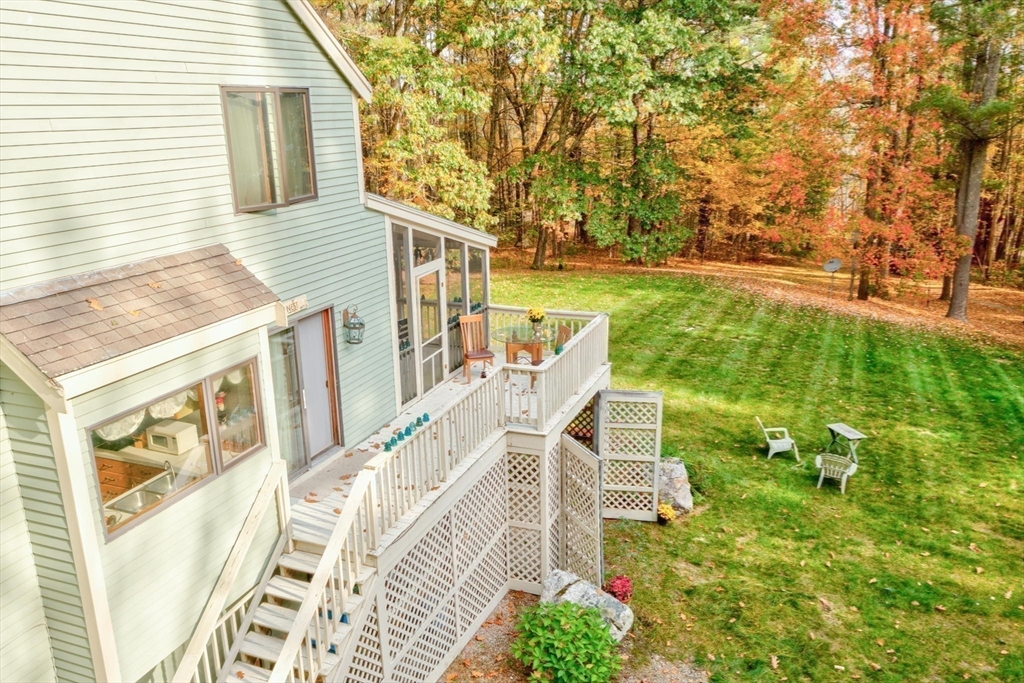 16 Wheeler Road Princeton, MA 01541 - Photo 35 of 40 a balcony with table and chairs