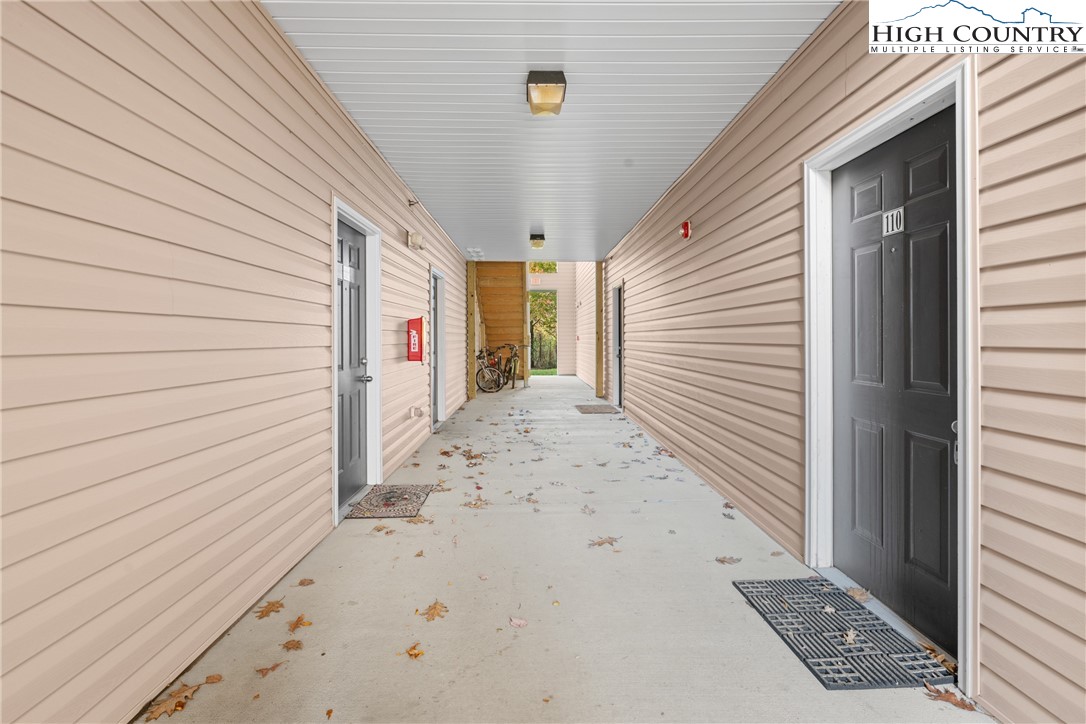 247 Eli Hartley Drive, Unit 111 Boone, NC 28607 - Photo 3 of 28 a view of a porch