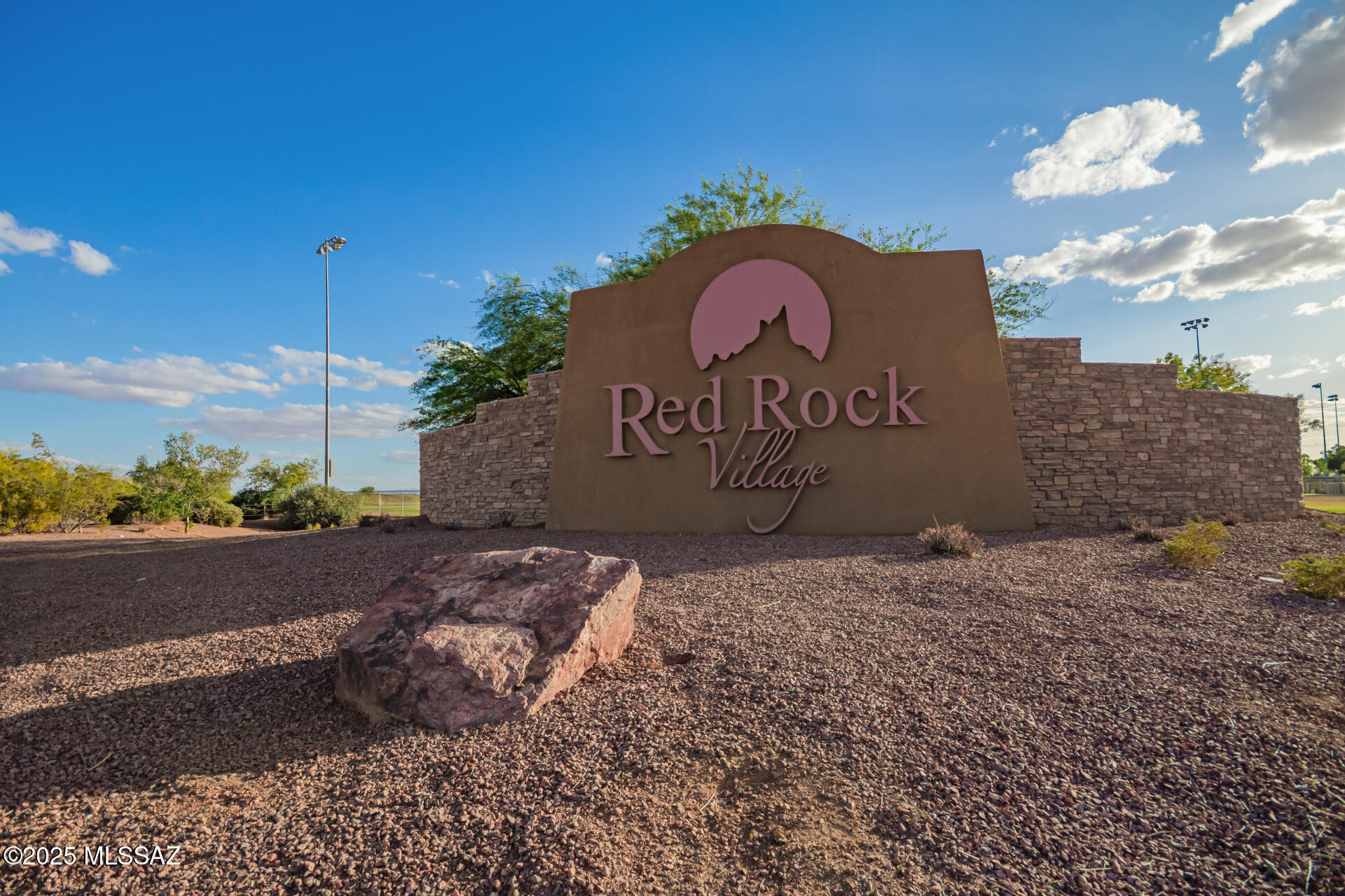20950 East Frontier Road Red Rock, AZ 85145 - Photo 44 of 44 a sign that is sitting on the side of a road