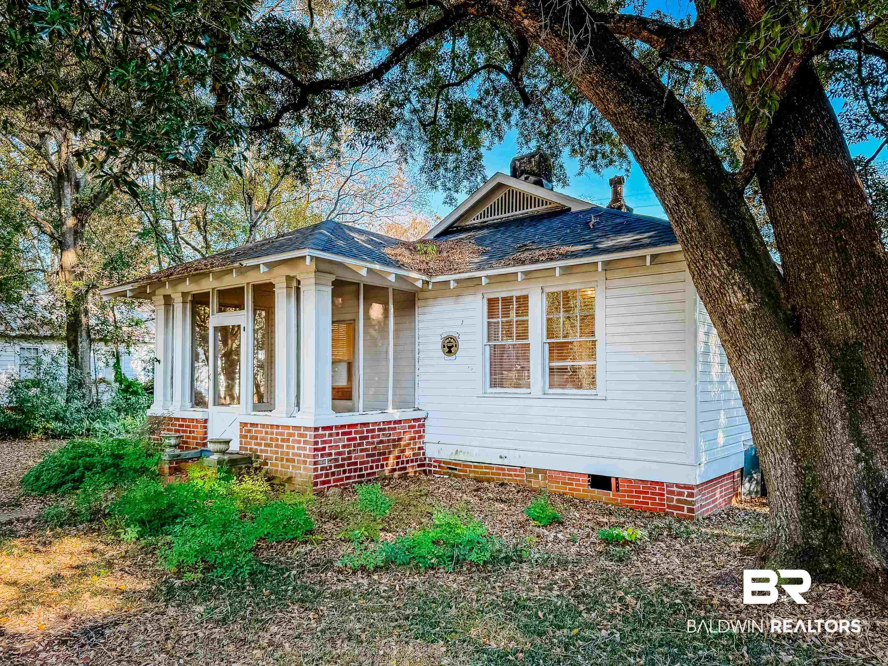 206 1st Street Mobile, AL 36611 - Photo 3 of 26 Bungalow-style home with crawl space, a shingled roof, and a sunroom