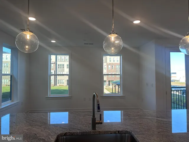 a view of a livingroom with windows