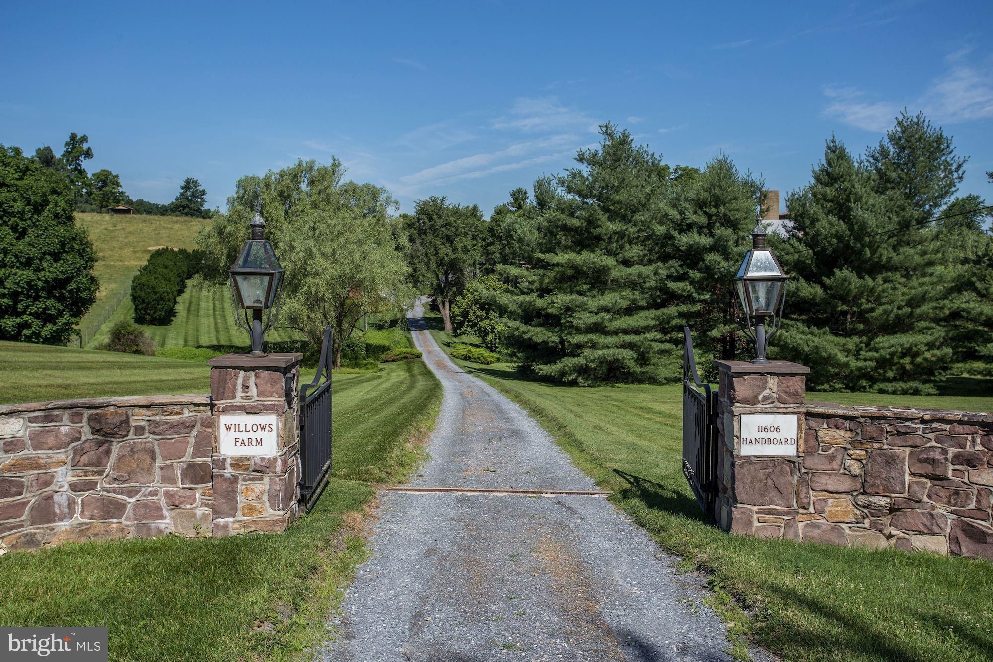 A long private driveway leads to the home