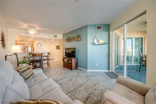 a living room with furniture and a table