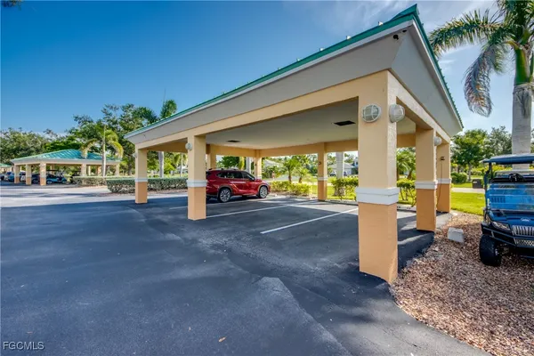 a view of swimming pool with outdoor seating