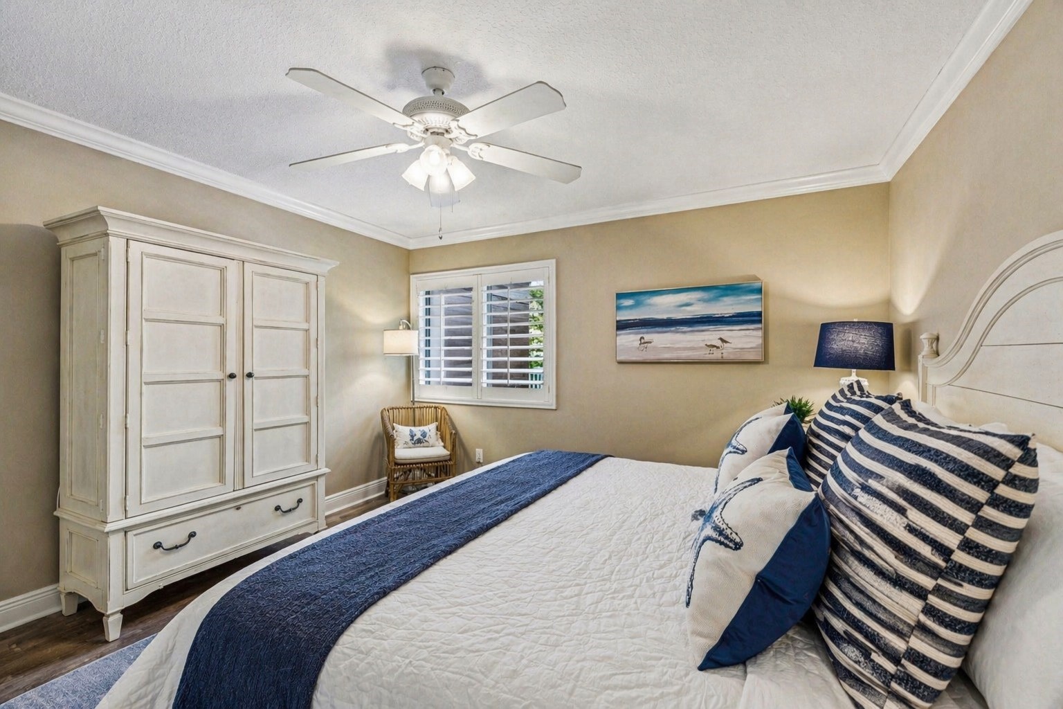 2117 Beachwood Road, Unit 2117 Fernandina Beach, FL 32034 - Photo 10 of 36 a bedroom with a large bed and windows