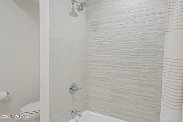 a bathroom with a toilet