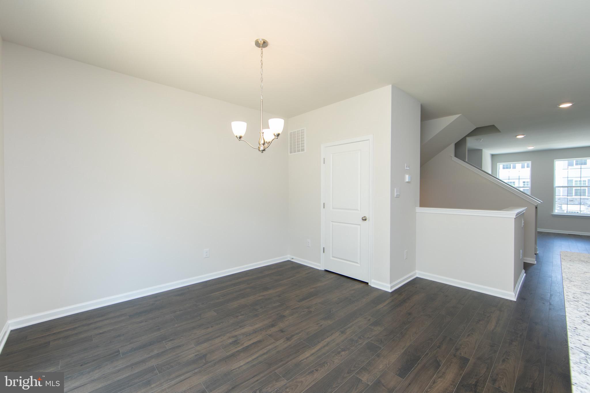 495 Monte Farm Road Mount Laurel, NJ 08054 - Photo 14 of 34 wooden floor in an empty room with a window