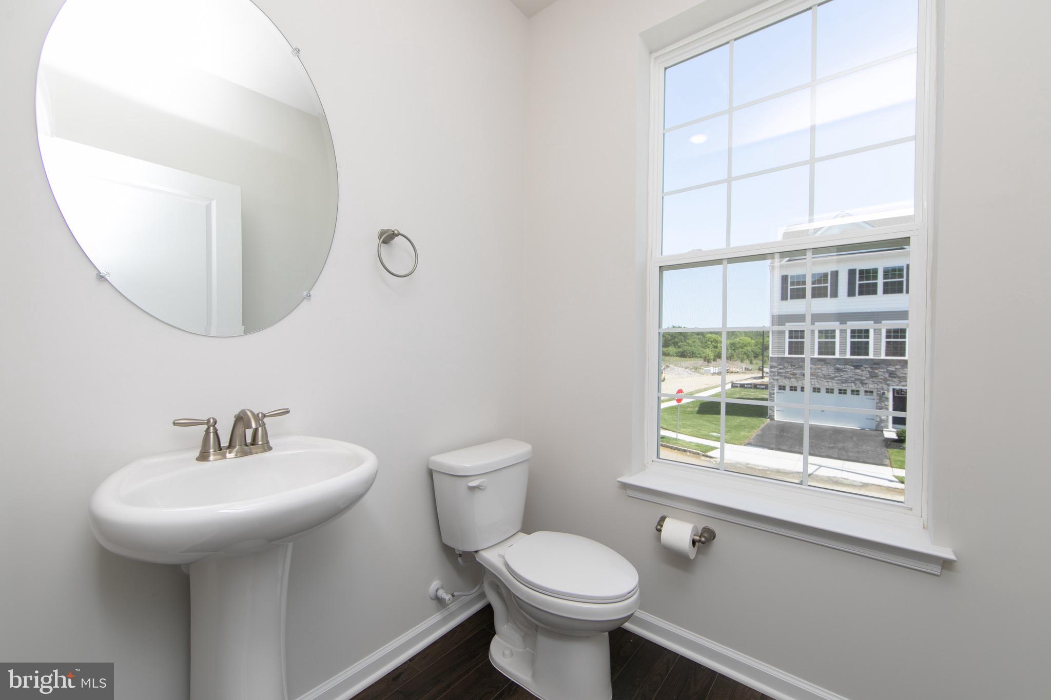 495 Monte Farm Road Mount Laurel, NJ 08054 - Photo 15 of 34 a bathroom with a sink and a mirror