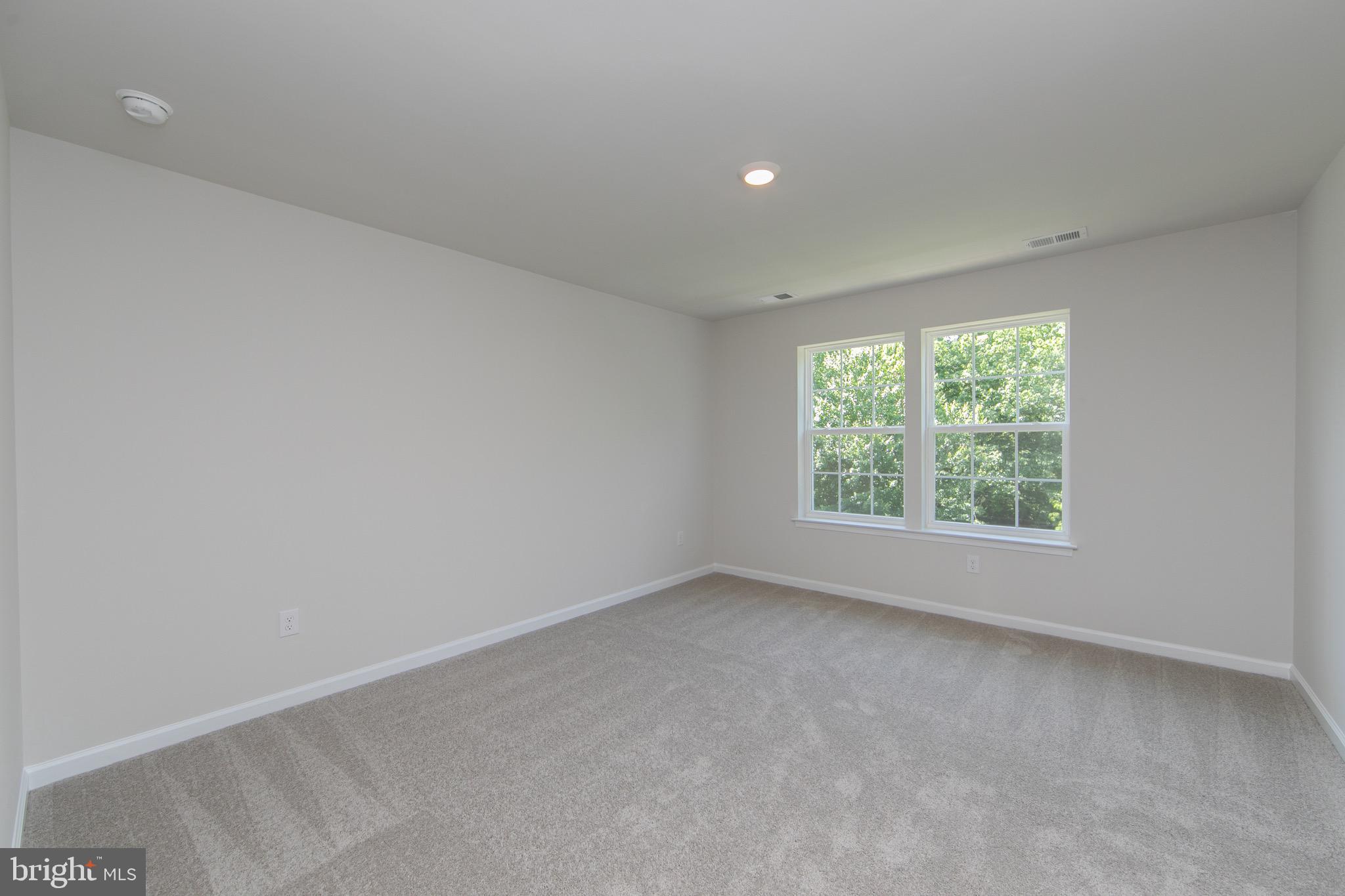 495 Monte Farm Road Mount Laurel, NJ 08054 - Photo 16 of 34 an empty room with windows