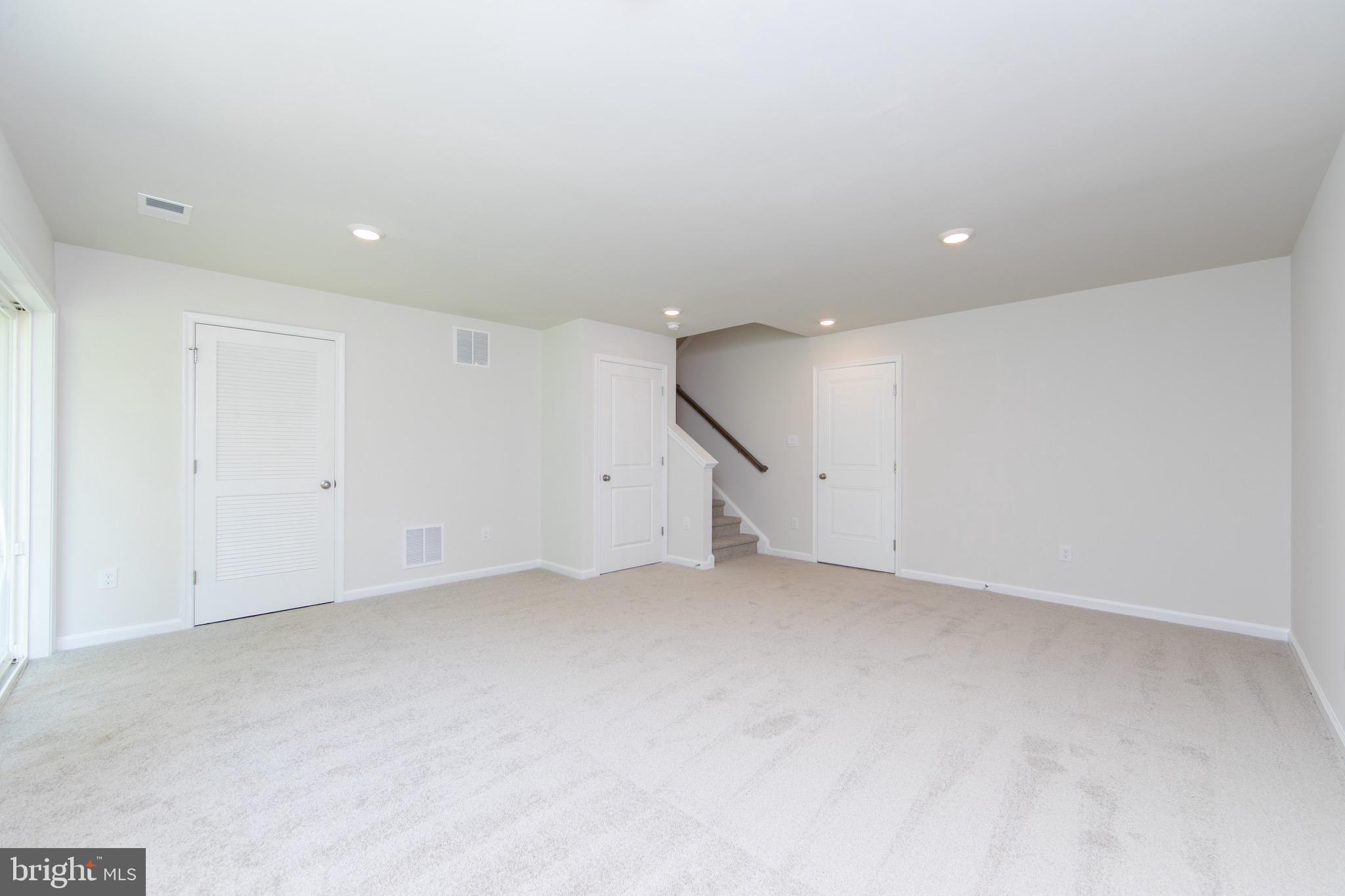 495 Monte Farm Road Mount Laurel, NJ 08054 - Photo 29 of 34 an empty room with a ceiling fan and entryway