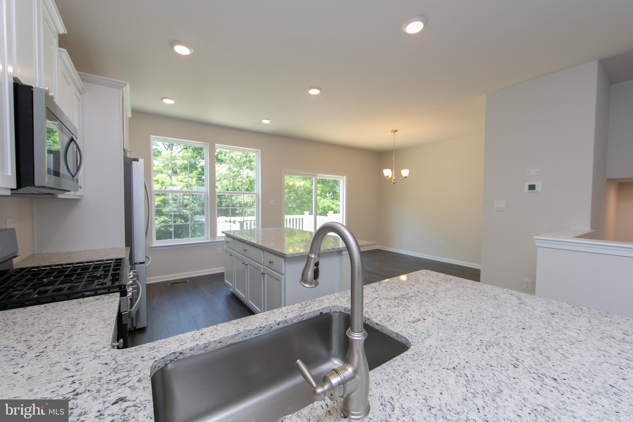 495 Monte Farm Road Mount Laurel, NJ 08054 - Photo 8 of 34 a kitchen with a sink and a large window
