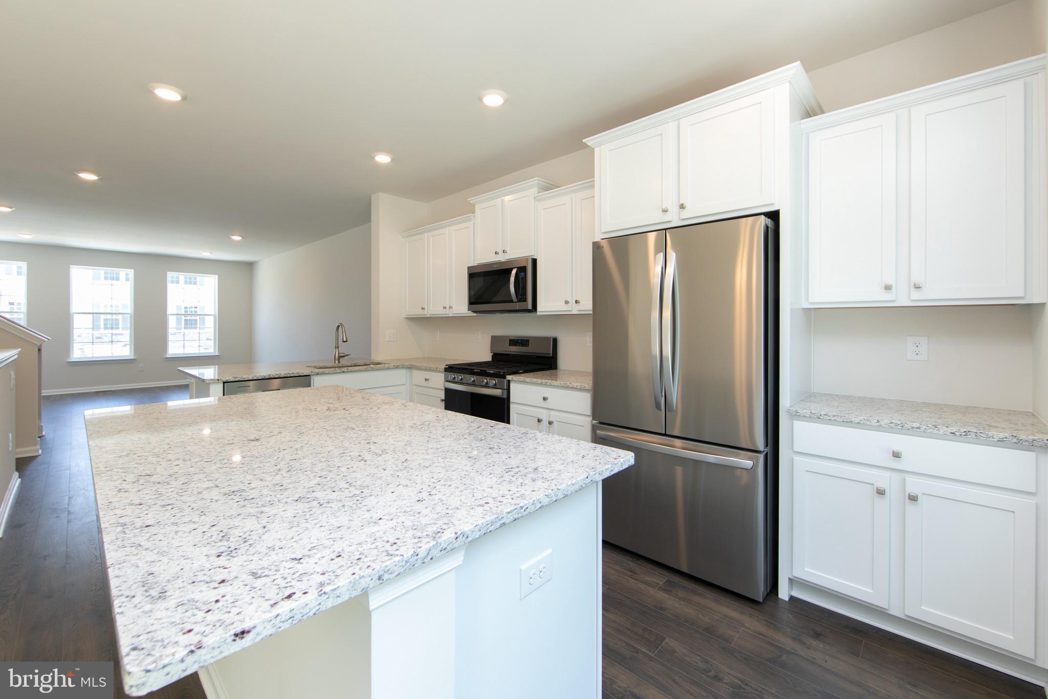 495 Monte Farm Road Mount Laurel, NJ 08054 - Photo 10 of 34 a kitchen with granite countertop a refrigerator and a sink