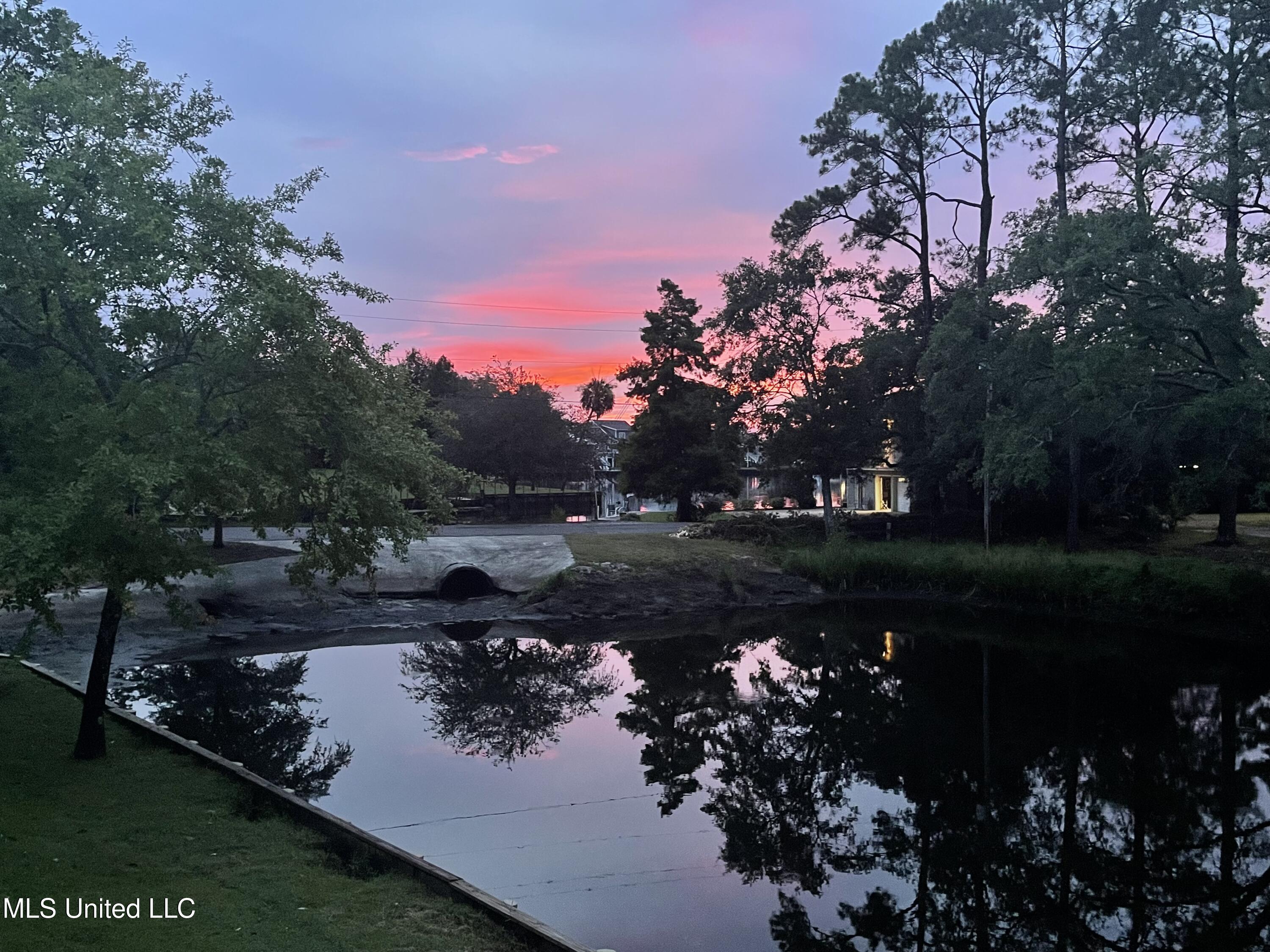 13 Keyser Lane Gulfport, MS 39507 - Photo 35 of 43 26.1 SUNSET FROM PRIMARY TUB