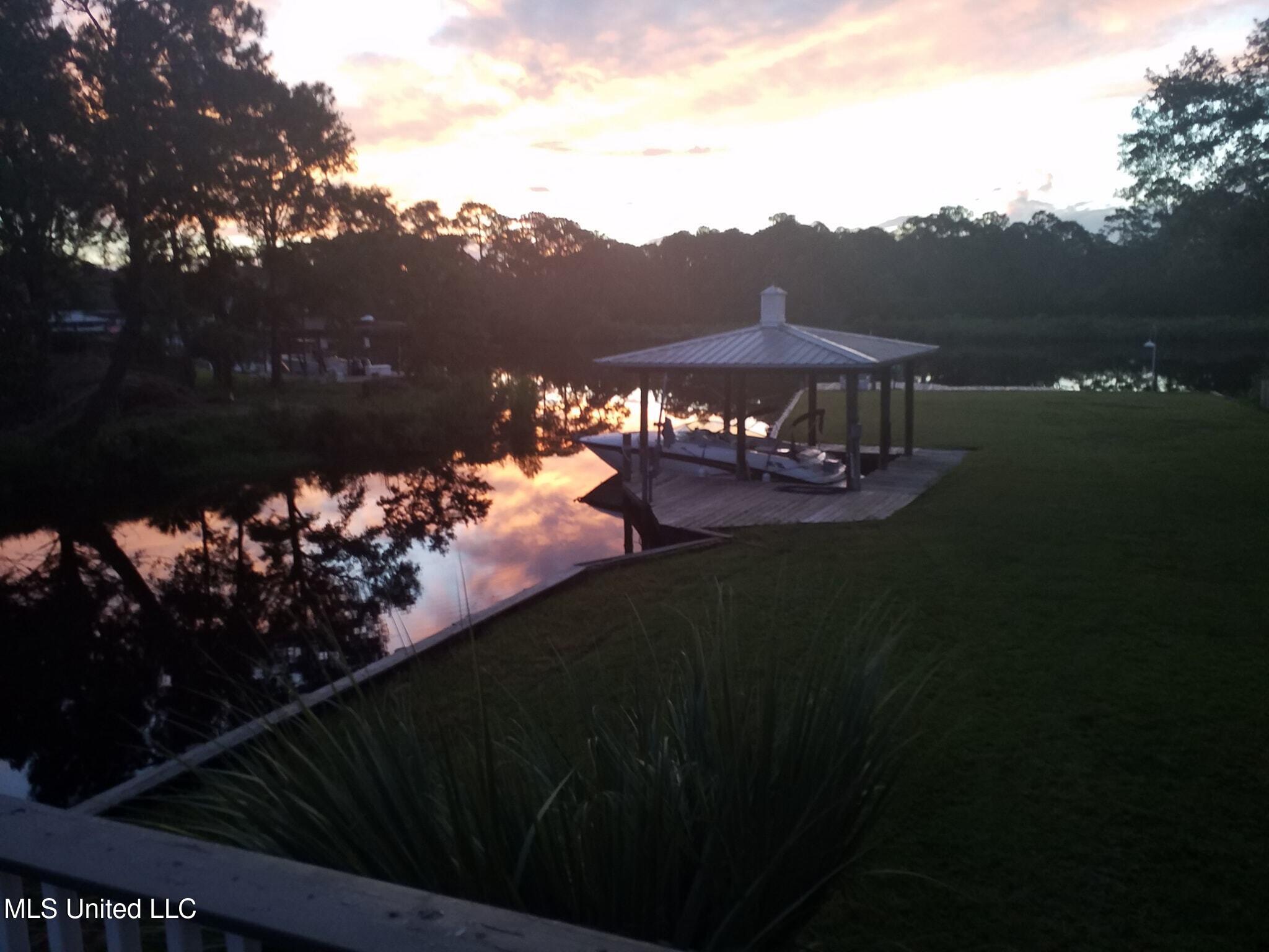 13 Keyser Lane Gulfport, MS 39507 - Photo 36 of 43 1.1 BOAT HOUSE FRON BACK DECK