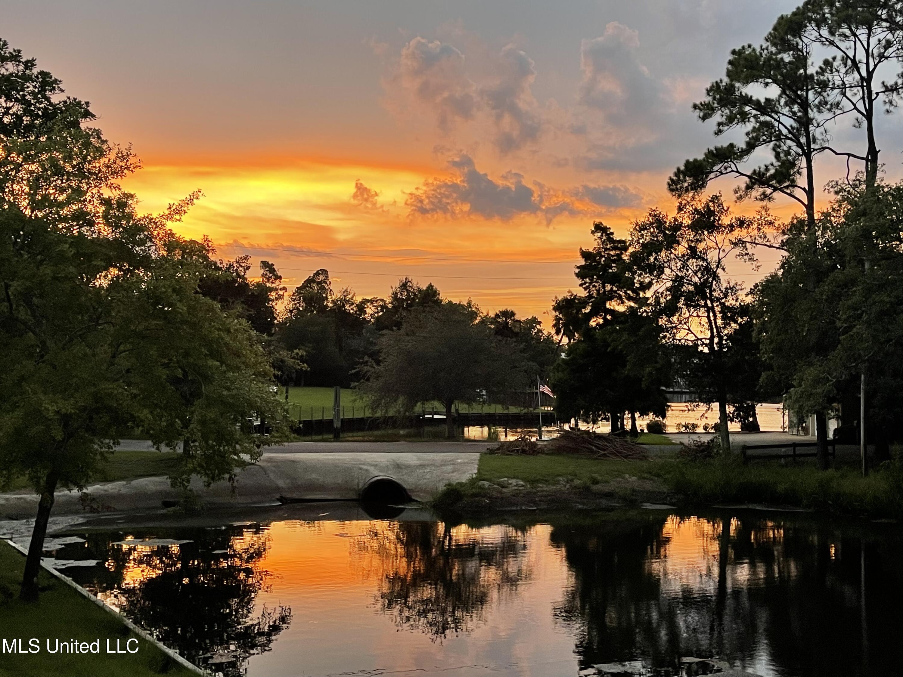 13 Keyser Lane Gulfport, MS 39507 - Photo 8 of 43 5.1 SUNSET FROM THE SOUTH DECK