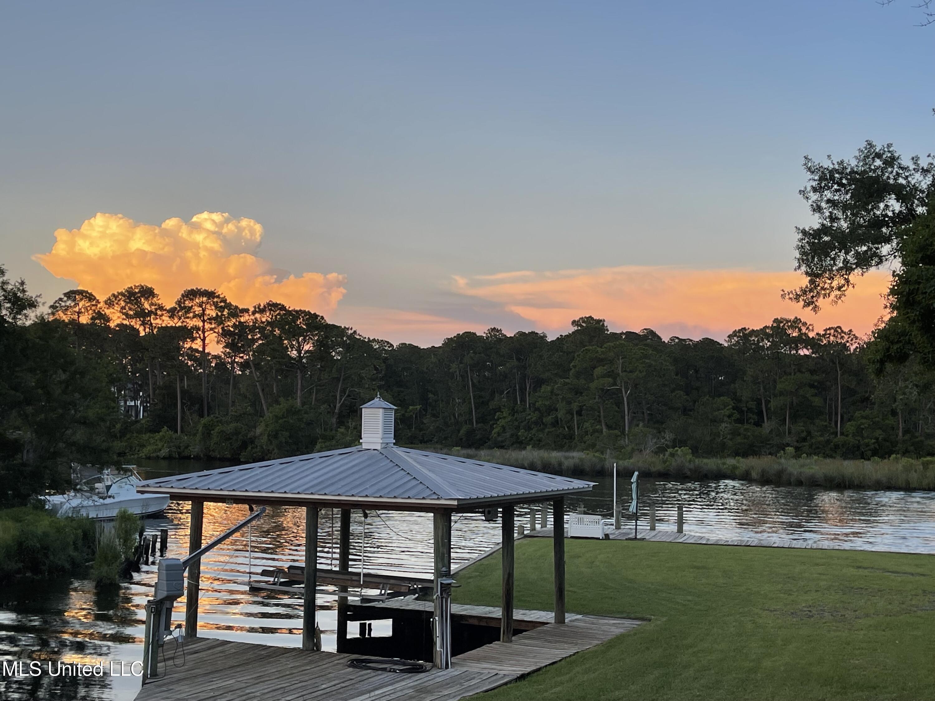 13 Keyser Lane Gulfport, MS 39507 - Photo 9 of 43 7.1 BAYOU VIEW FROM LIVINGROOM