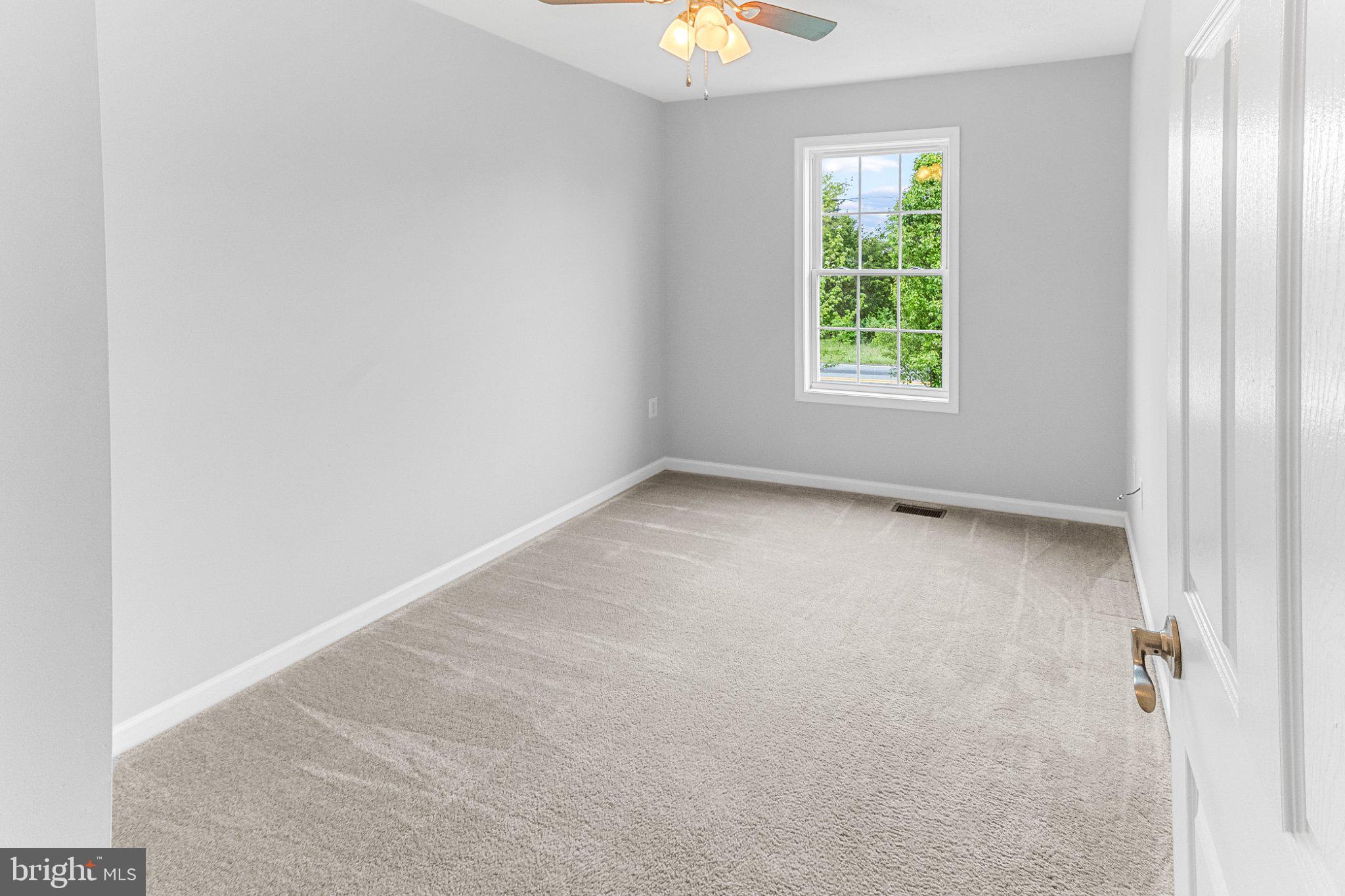 2471 Sulphur Springs Road Inwood, WV 25428 - Photo 13 of 44 Bright and airy blank canvas room.