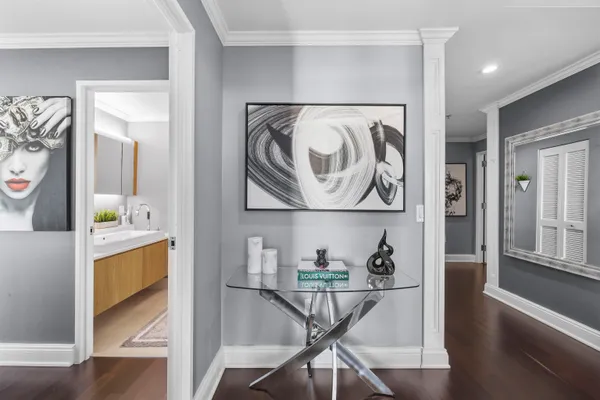 a view of kitchen with furniture and wooden floor