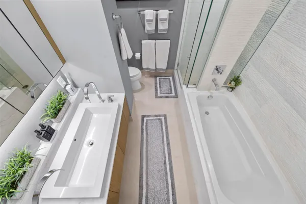 a view of living room with furniture and wooden floor