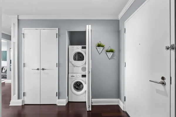a view of a storage & utility room with a washer and dryer