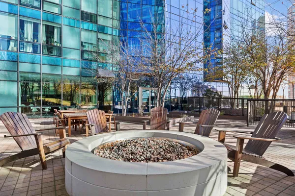 a view of a chairs and table in the patio