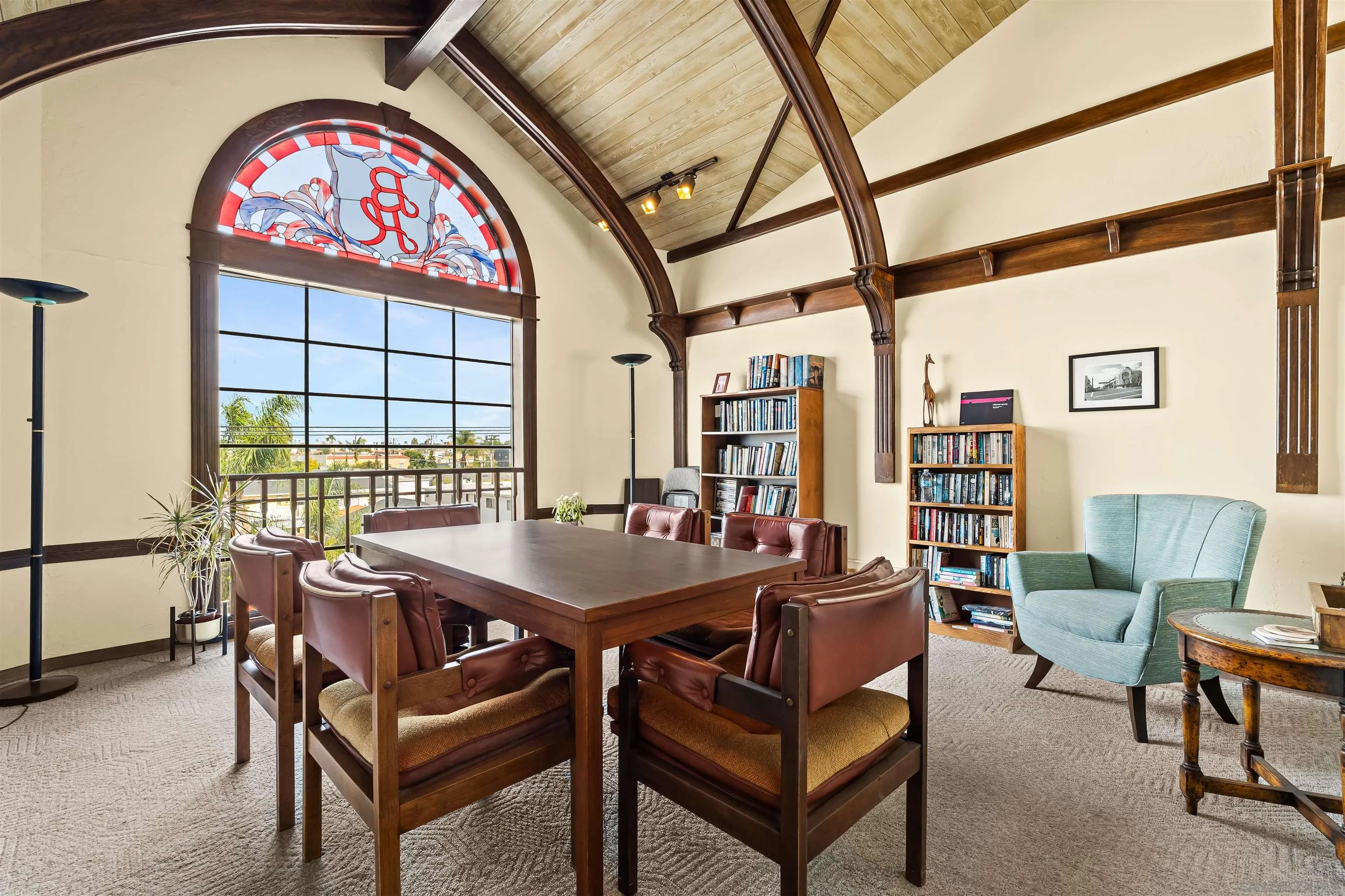 1263 Robinson Avenue, Unit 13 San Diego, CA 92103 - Photo 33 of 40 a view of a dining room with furniture and a window