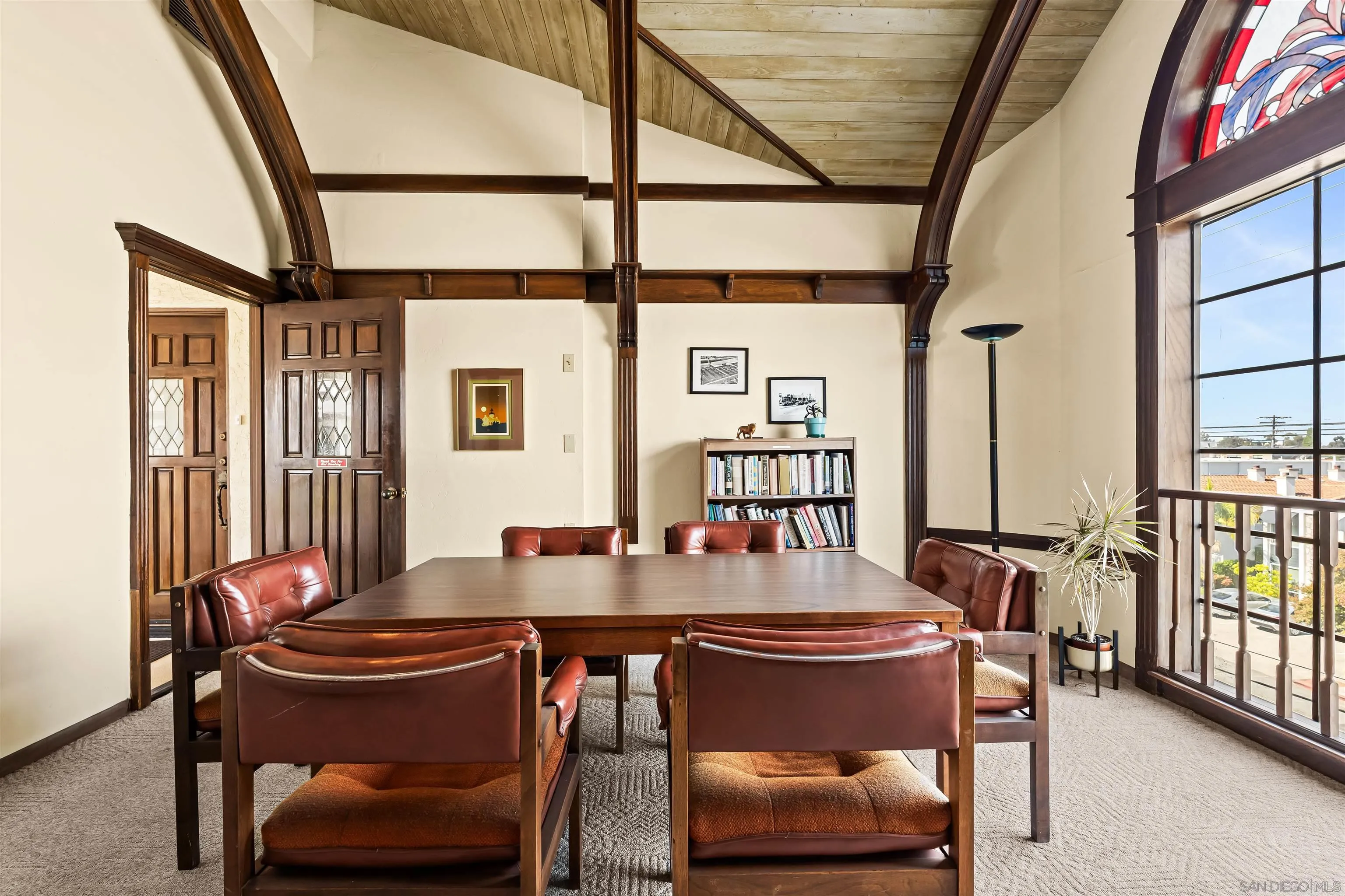 1263 Robinson Avenue, Unit 13 San Diego, CA 92103 - Photo 34 of 40 a view of a dining room with furniture and a window