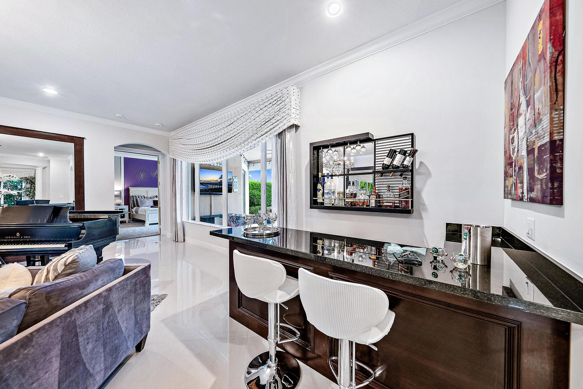 127 Steeple Circle Jupiter, FL 33458 - Photo 7 of 56 Living Area & Custom Bar