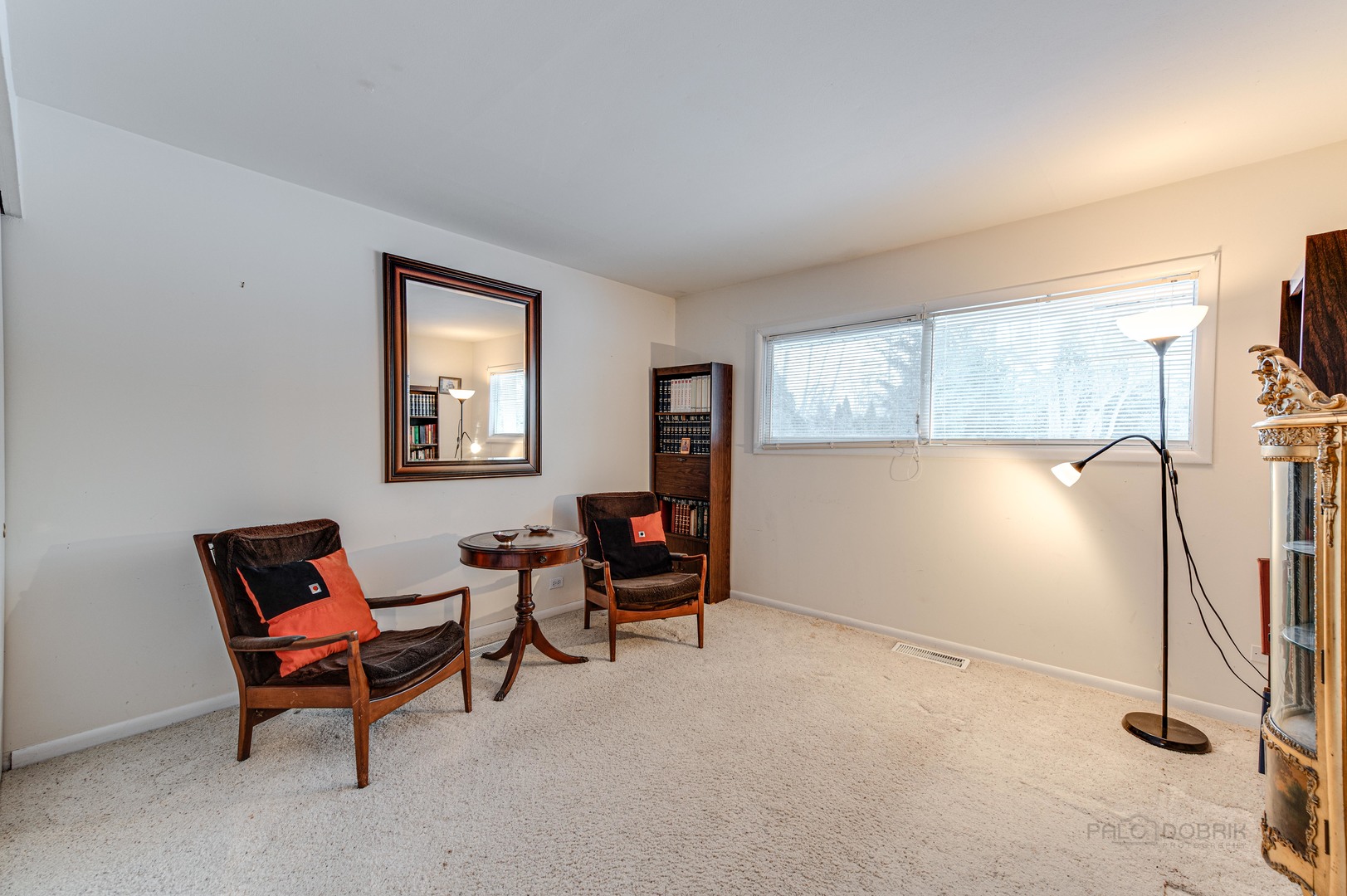 780 West Deerpath Road Lake Forest, IL 60045 - Photo 18 of 35 a living room with furniture a air conditioner and a window