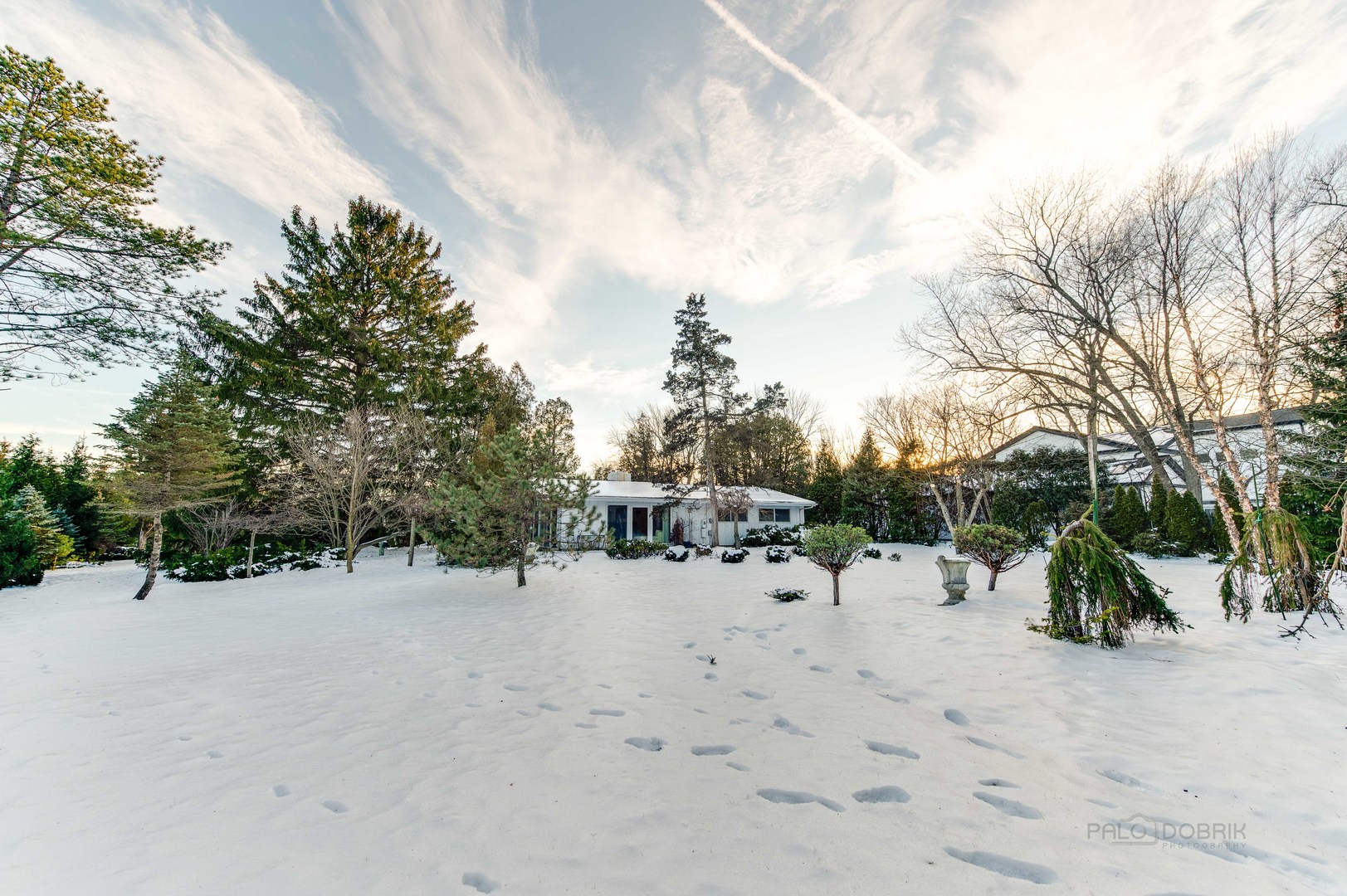 780 West Deerpath Road Lake Forest, IL 60045 - Photo 31 of 35 a view of white house covered in snow