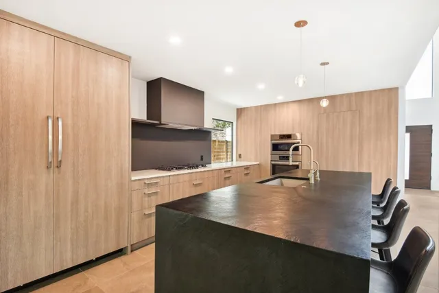 a bathroom with a sink and mirror