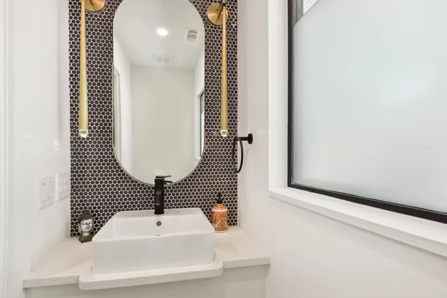 a bedroom with furniture and a wooden floor